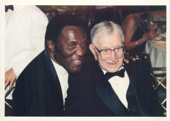 Rafer Johnson and legendary UCLA men's basketball coach John Wooden